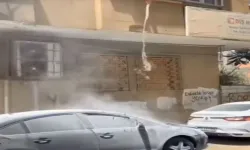 Otomobil Yangınına Pencereden Kovayla Müdahale