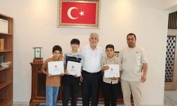 Örnek davranış sergileyen çocuklar Müftülükte ağırlandı