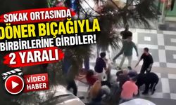 Sokak ortasında döner bıçağıyla birbirlerine girdiler, o anlar kamerada! 2 yaralı